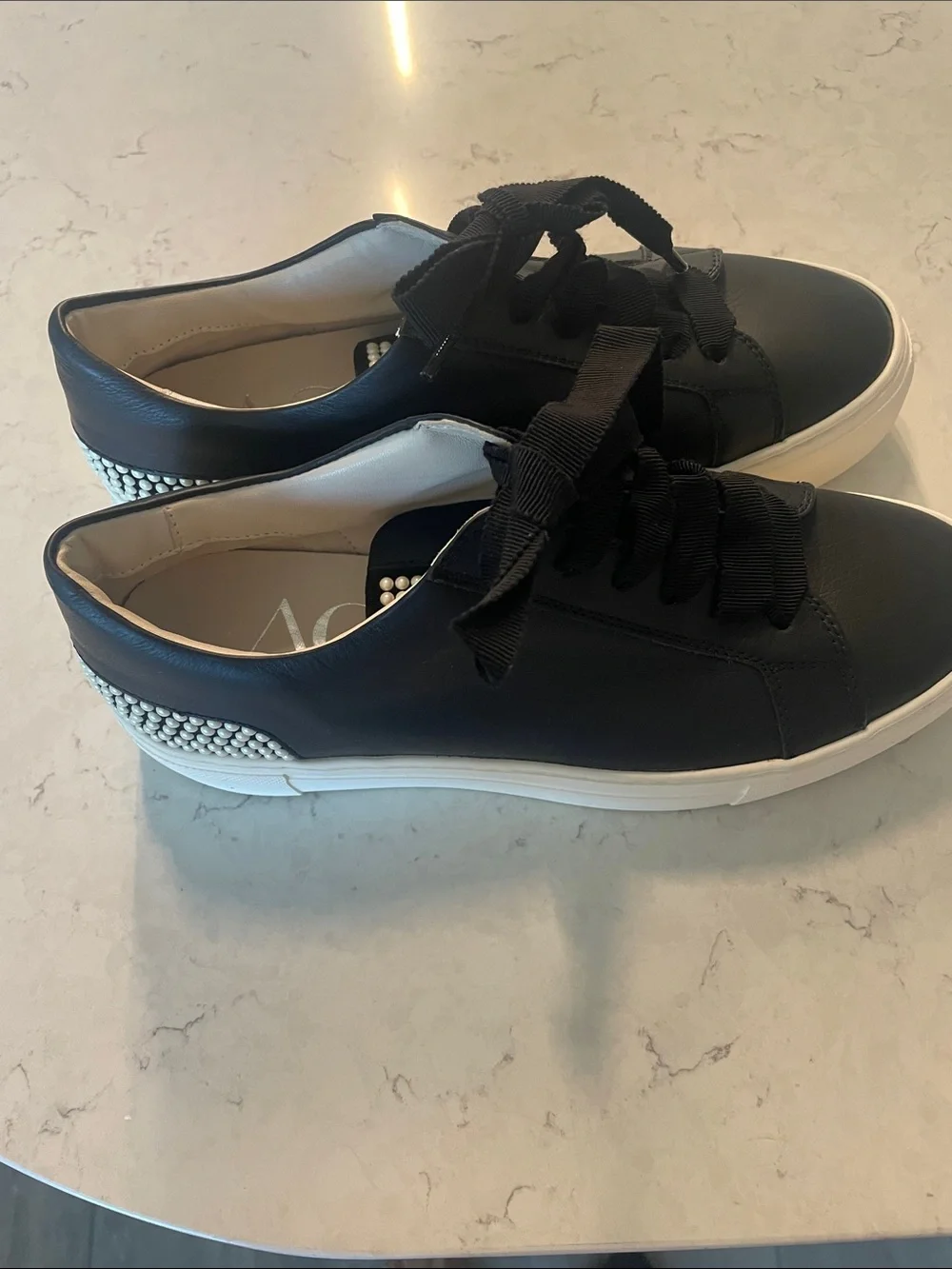 AGL Black Leather Low-Top Sneakers with Pearl Tongue Detail